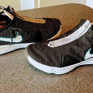 Nike Black and White Sneakers with Teal Accents